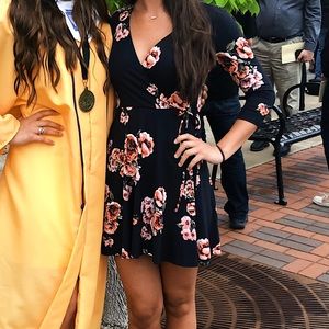 Black flower above the knee dress